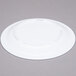A white Thunder Group Narrow Rim Nustone melamine plate.