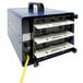 A blue OdorStop air purifier box with a yellow cord.