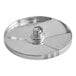 A silver circular AvaMix slicing plate with a small hole in the center.