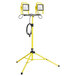 A yellow light fixture on a yellow stand.