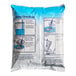 A white and blue bag of DOLE Soft Serve Orange Mix with mixing directions.