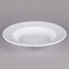 A white bowl with a wide rim.