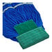 A blue Lavex wet mop with a green headband.