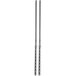 a pair of chopsticks with a diamond pattern