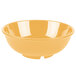 A close-up of a yellow GET Diamond Mardi Gras melamine bowl.