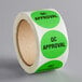 A roll of green and white Lavex QC Approval paper labels.