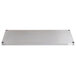 A rectangular stainless steel shelf with screws on a white background.