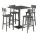 A Lancaster Table & Seating industrial bar height table with live edge detail, slate gray finish, and four bar stools.