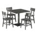 A Lancaster Table & Seating square slate gray dining table with four chairs around it.