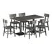 A Lancaster Table & Seating live edge table with slate gray finish and six chairs.