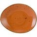 A brown Tuxton china ellipse plate with a swirl design.