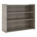 A Shadow Elm laminate school age storage shelf with three shelves.