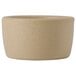 A Tuxton TuxTrendz beige ceramic ramekin with a handle.