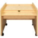 A Tot Mate maple laminate mobile desk with wheels.