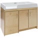 A natural birch plywood Tot Mate toddler changing table with two drawers.