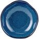 A Tuxton TuxTrendz Artisan Night Sky china fruit dish with a blue circle on a white background.