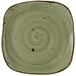 A close up of a Tuxton square china plate with a green and brown swirl pattern.