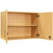 A Tot Mate maple wooden wall cabinet with two shelves and two doors open.