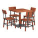 A Lancaster Table & Seating rustic mahogany wood table with four chairs.