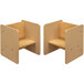 A beige and maple laminate activity cube with a shelf and a step.