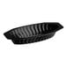 A black plastic oval serving boat with wavy lines.