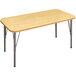 A rectangular wooden table with metal legs.