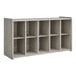 A white Tot Mate wall cubbie storage unit with shelves and drawers.