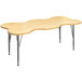 A rectangular wooden Tot Mate My Place table with legs.