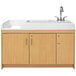 A maple laminate infant changing table with a right side sink.