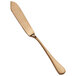 A close-up of a Bon Chef matte rose gold butter knife with a long handle.