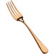 A close up of a Bon Chef rose gold salad/dessert fork.