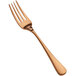 A Bon Chef Como salad/dessert fork with a rose gold handle.