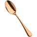 a close-up of a shiny gold object