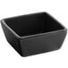 a black square bowl with a white background