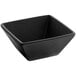 An Acopa matte black square stoneware bowl.