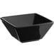 a black square bowl with a white background