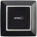 An Acopa glossy black square stoneware plate with white trim.