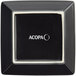 A black square Acopa stoneware plate with white text.