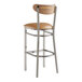 A Lancaster Table & Seating bar stool with a wooden and leather seat.