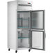 An Avantco stainless steel reach-in refrigerator with glass doors open.