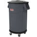 A black plastic Suncast round trash can lid.