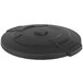 a black circular object with a round lid