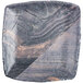 a square plate with a black and brown striped surface