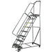 A gray steel Ballymore rolling ladder with metal railings.