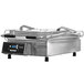 A Proluxe Vantage Clamshell Sandwich Grill with smooth plates and a digital display.