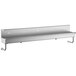 A silver stainless steel Regency multi-station hand sink shelf with holes.
