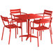 A red Lancaster Table & Seating outdoor table with four arm chairs.