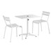 A white Lancaster Table & Seating outdoor table with umbrella hole and 2 chairs.
