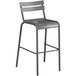 A gray bar stool with a white backrest.