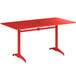 A red rectangular Lancaster Table & Seating outdoor table with metal legs.